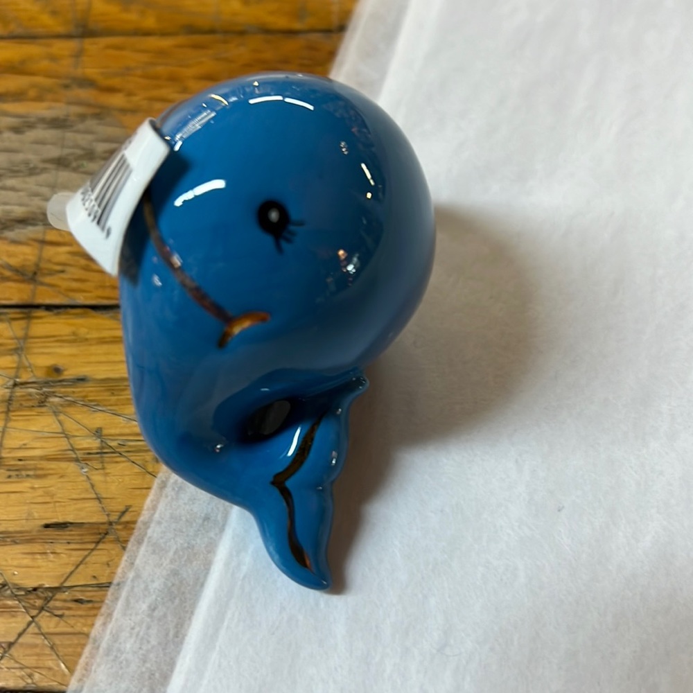 Nora Fleming retired St. Jude’s whale.